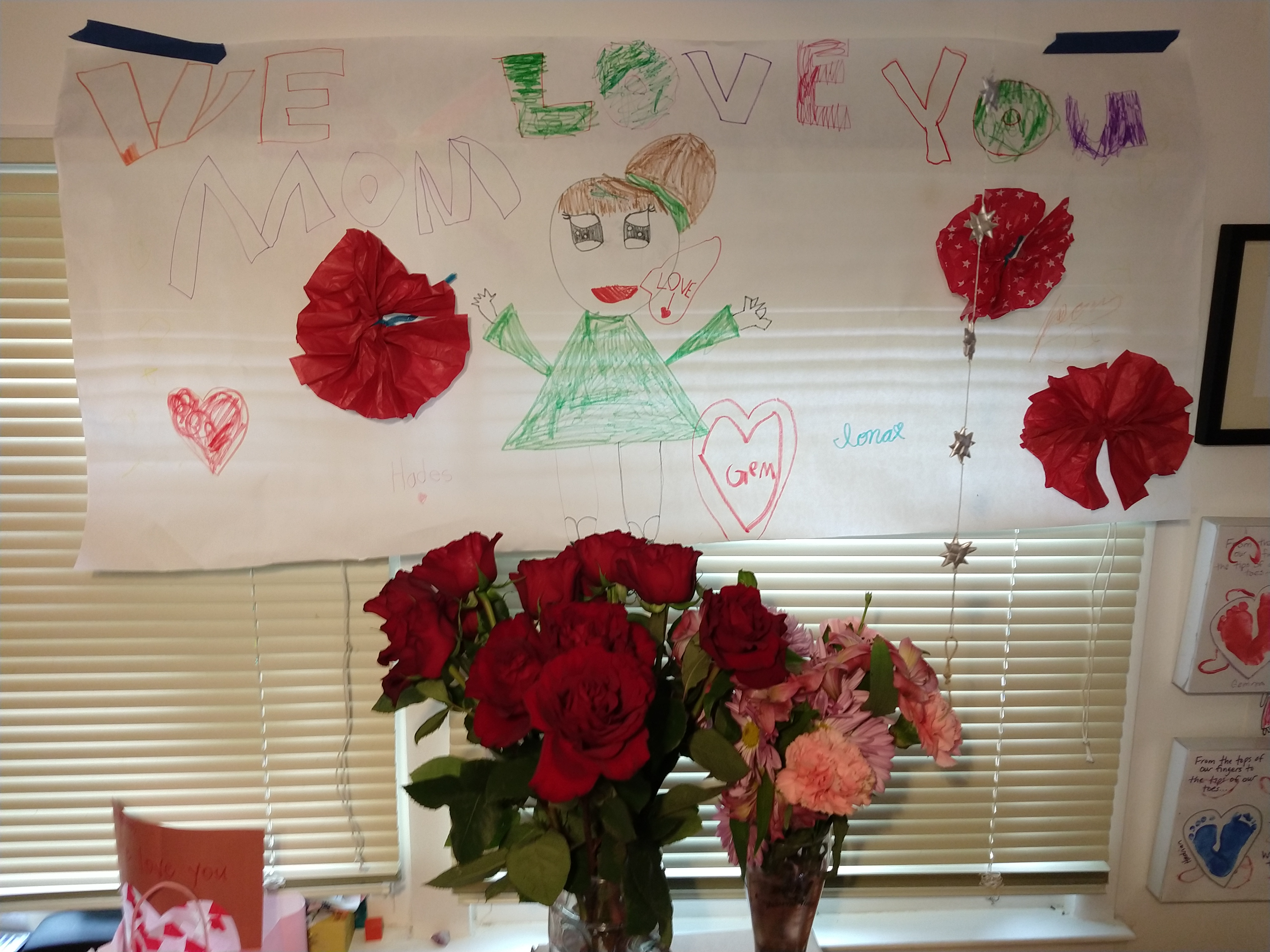 Mother's day sign and flowers